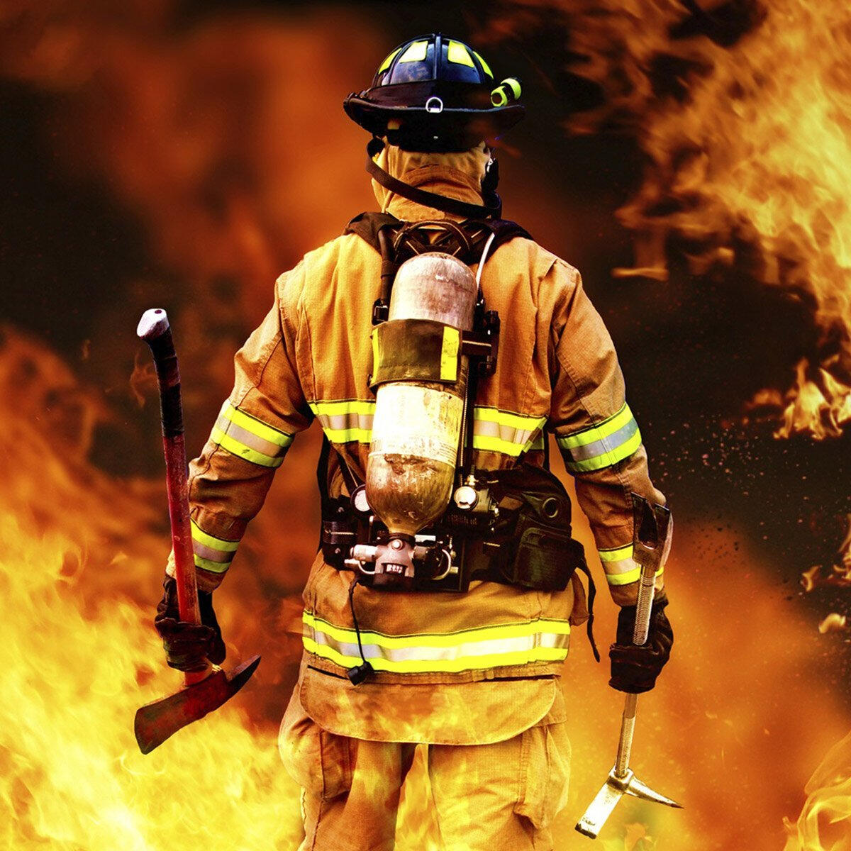 Firefighter looking into flames